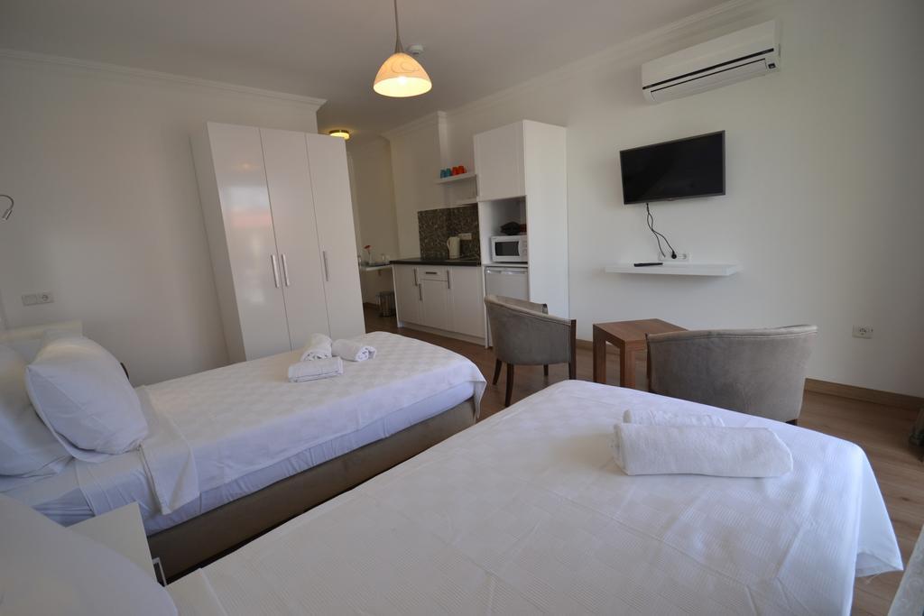Kelebek Studio Apartments Калкан Номер фото